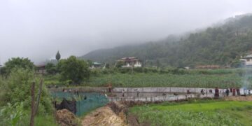 Villagers restore drying sacred lake in Kanglung